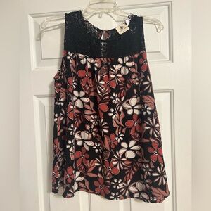 Beautiful sleeveless top in Black and Rust - lace yoke with a keyhole back.